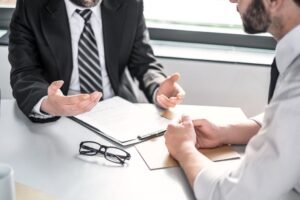 Legal Consultation: Attorney discussing legal matters with a client